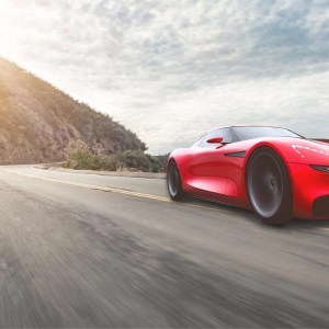Red car on the highway